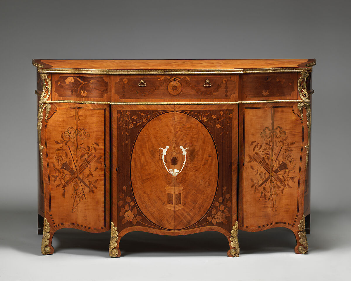 Commode, Pine and oak veneered with satinwood, tulipwood, ash, thuya and other woods, ivory; gilt bronze, British