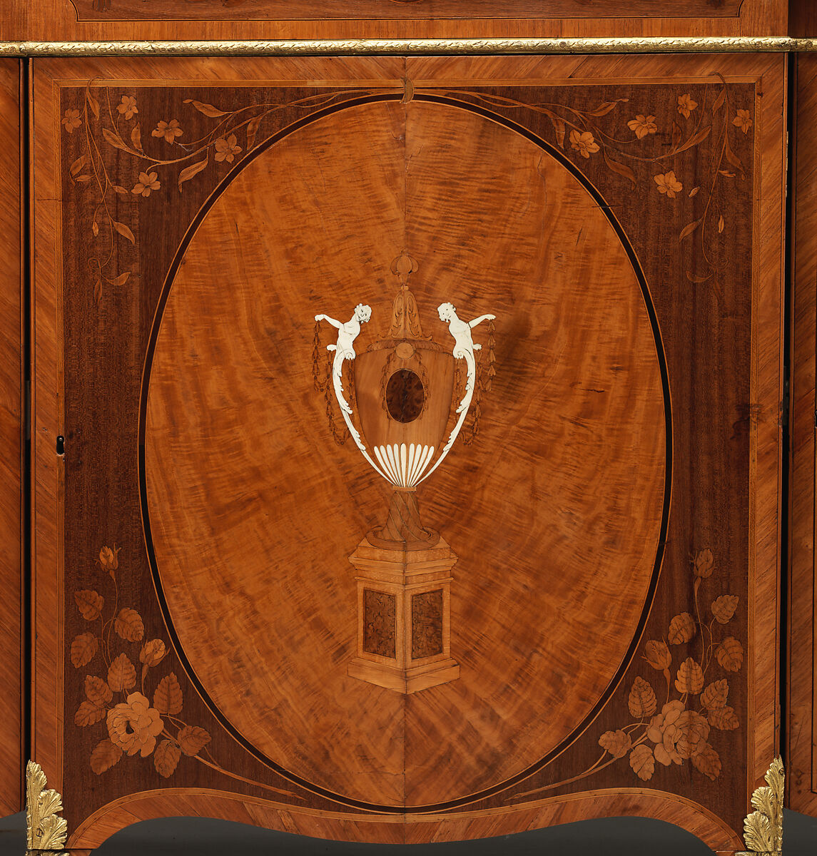 Commode, Pine and oak veneered with satinwood, tulipwood, ash, thuya and other woods, ivory; gilt bronze, British