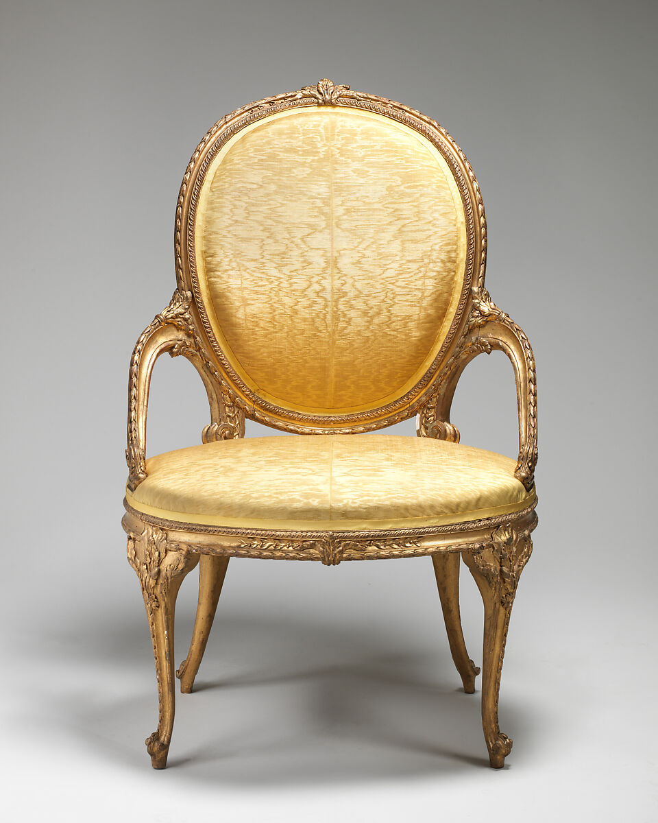 Pair of armchairs (part of a set), Carved and gilt beech, moiré silk not original to the frames, British