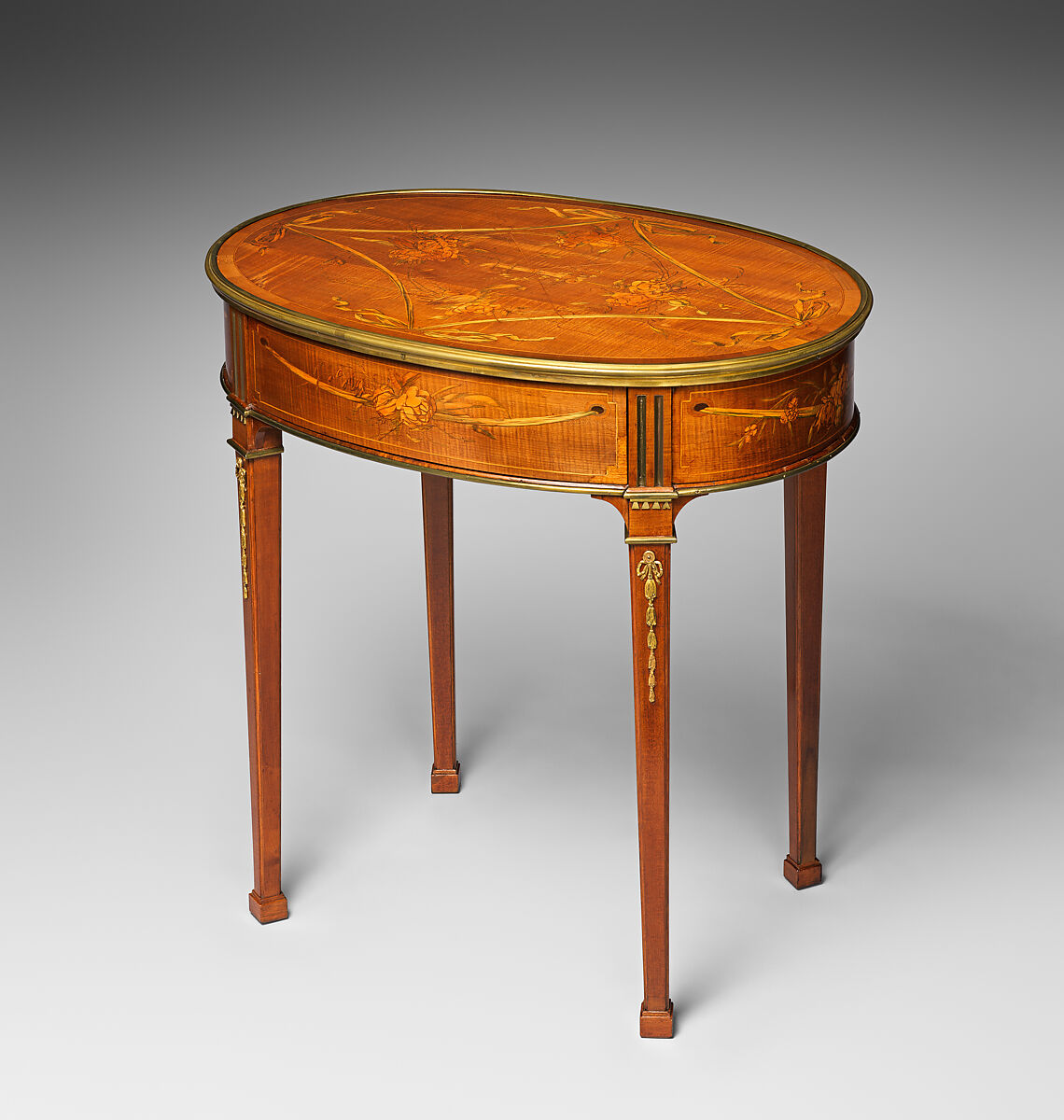 Oval table, David Roentgen  German, Oak, walnut, pine, cherry, and maple, veneered with maple, hornbeam, holly (all partially stained), cherry, mahogany, tulipwood, and other woods; gilt bronze, iron, brass, steel; partially tooled and gilded leather, German, Neuwied am Rhein