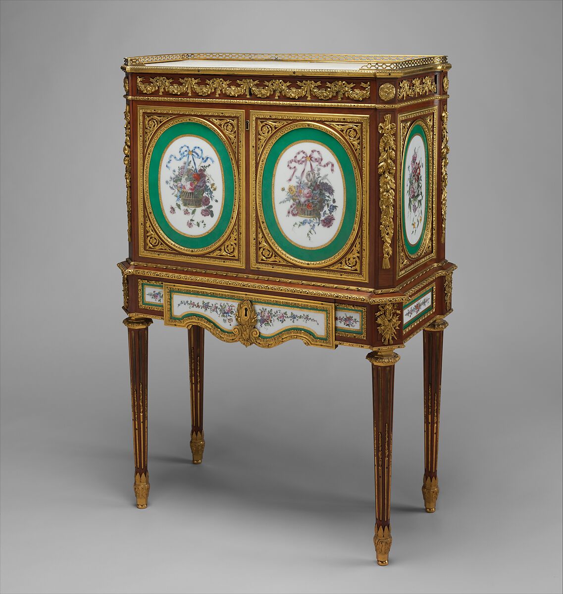 Drop-front desk (secrétaire à abattant or secrétaire en cabinet), Martin Carlin (French, near Freiburg im Breisgau ca. 1730–1785 Paris), Oak veneered with tulipwood, amaranth, holly, and ebonized holly; ten soft-paste porcelain plaques; gilt-bronze mounts; marble; velvet (not original), French, Paris and Sèvres 