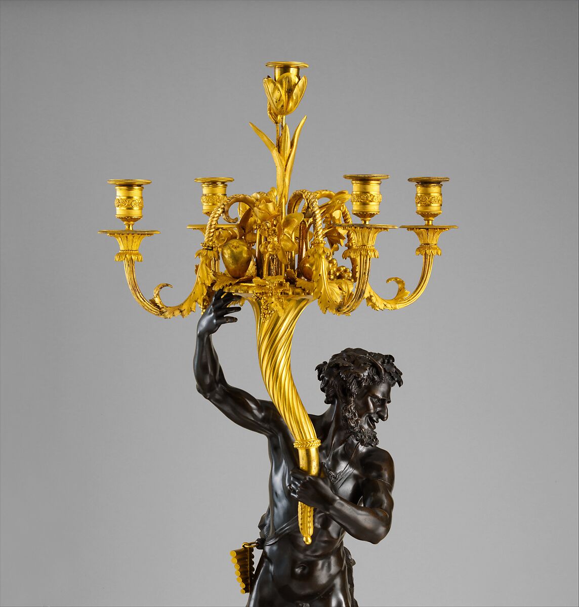 Five-light candelabrum (one of a pair), Derived from a model by Clodion (Claude Michel) (French, Nancy 1738–1814 Paris), Gilt and patinated bronze, serpentine marble, French