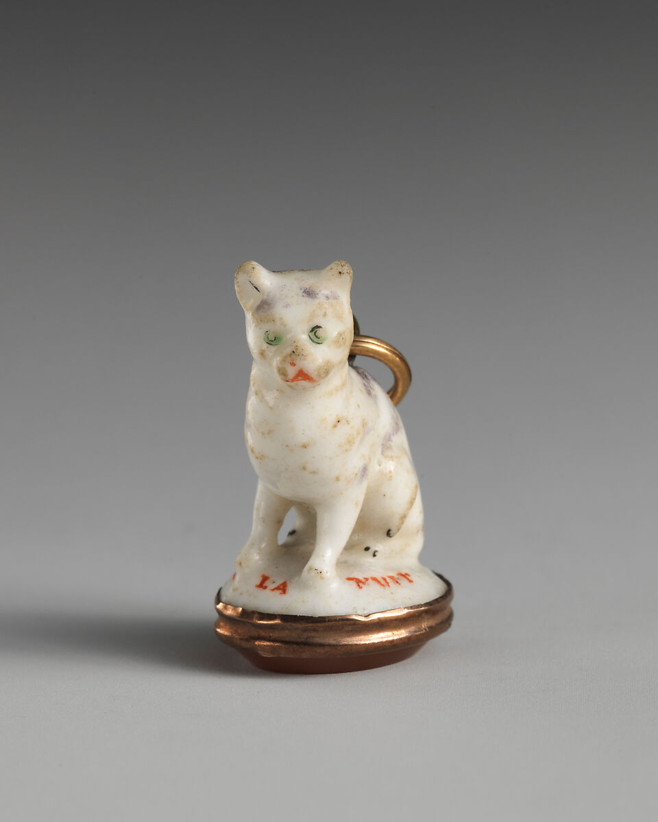 Miniature seal in the form of a cat, Chelsea Porcelain Manufactory (British, 1745–1784, Red Anchor Period, ca. 1753–58), Soft-paste porcelain, carnelian, metal, gilt metal, British, Chelsea 