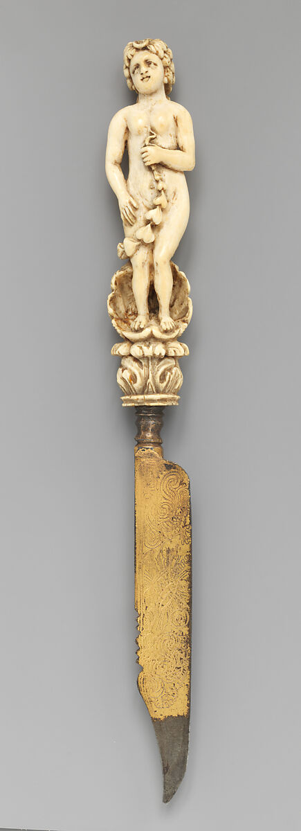 Knife with carved handle of nude female with crescent in hair standing in a half shell holding a swag, Steel gilt, ivory, Italian 