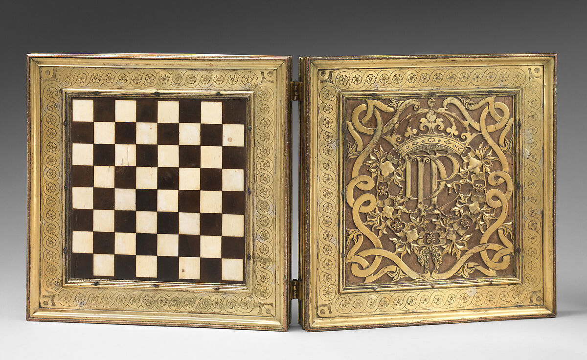Chess and tric-trac board, Copper-gilt, walnut, ivory, mother-of-pearl, serpentine, rosso antico marble, Spanish, Castile 
