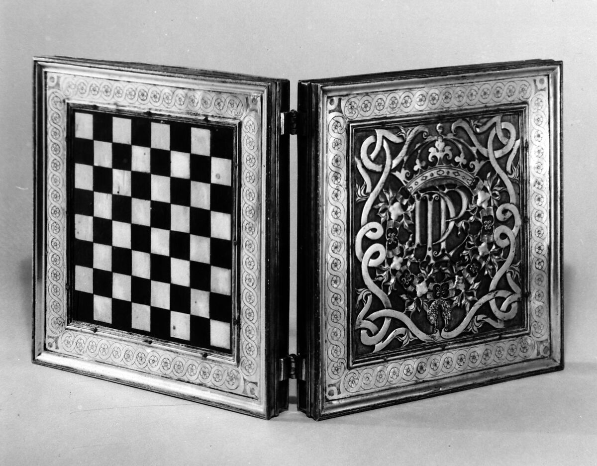 Chess and tric-trac board, Copper-gilt, walnut, ivory, mother-of-pearl, serpentine, rosso antico marble, Spanish, Castile