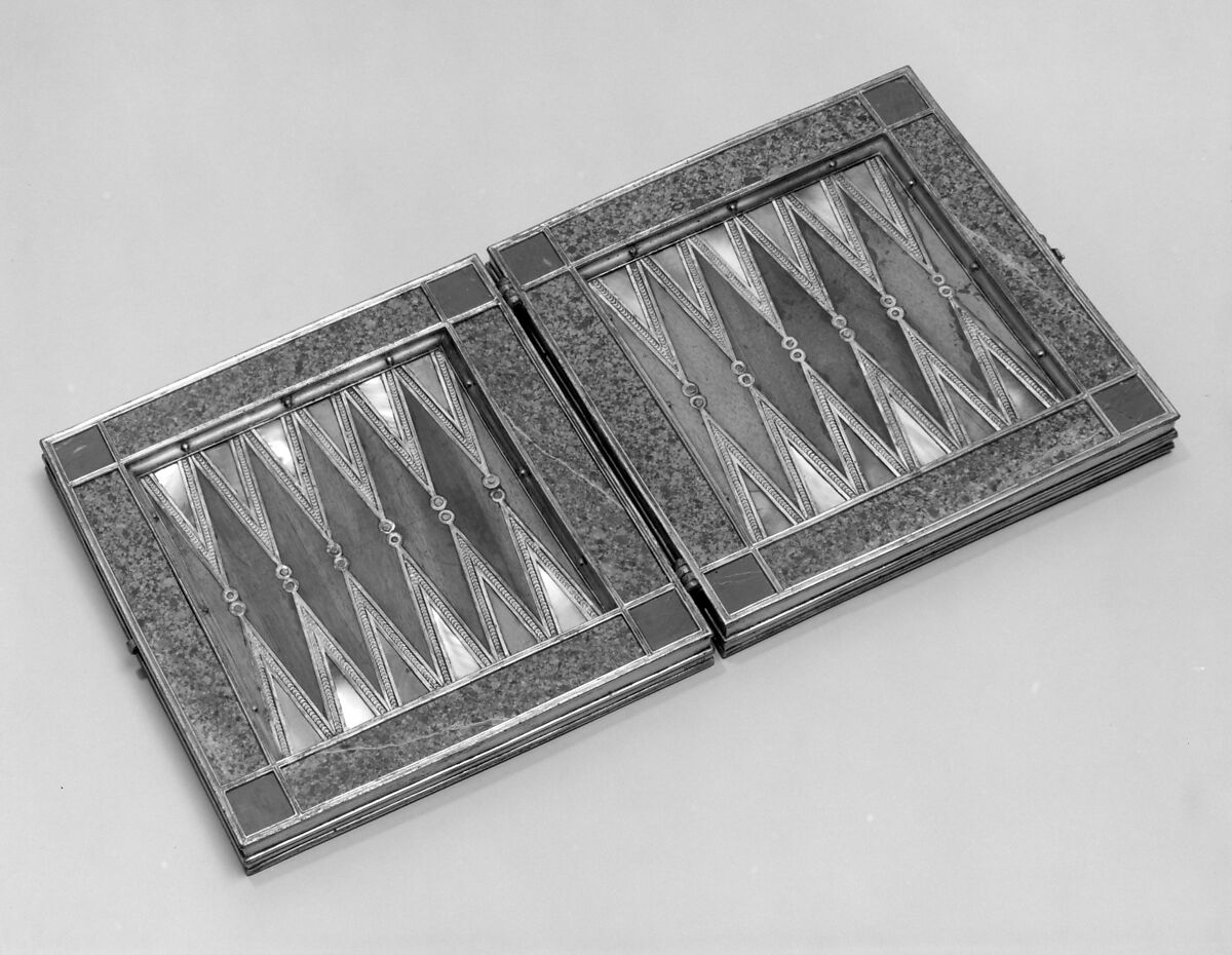 Chess and tric-trac board, Copper-gilt, walnut, ivory, mother-of-pearl, serpentine, rosso antico marble, Spanish, Castile