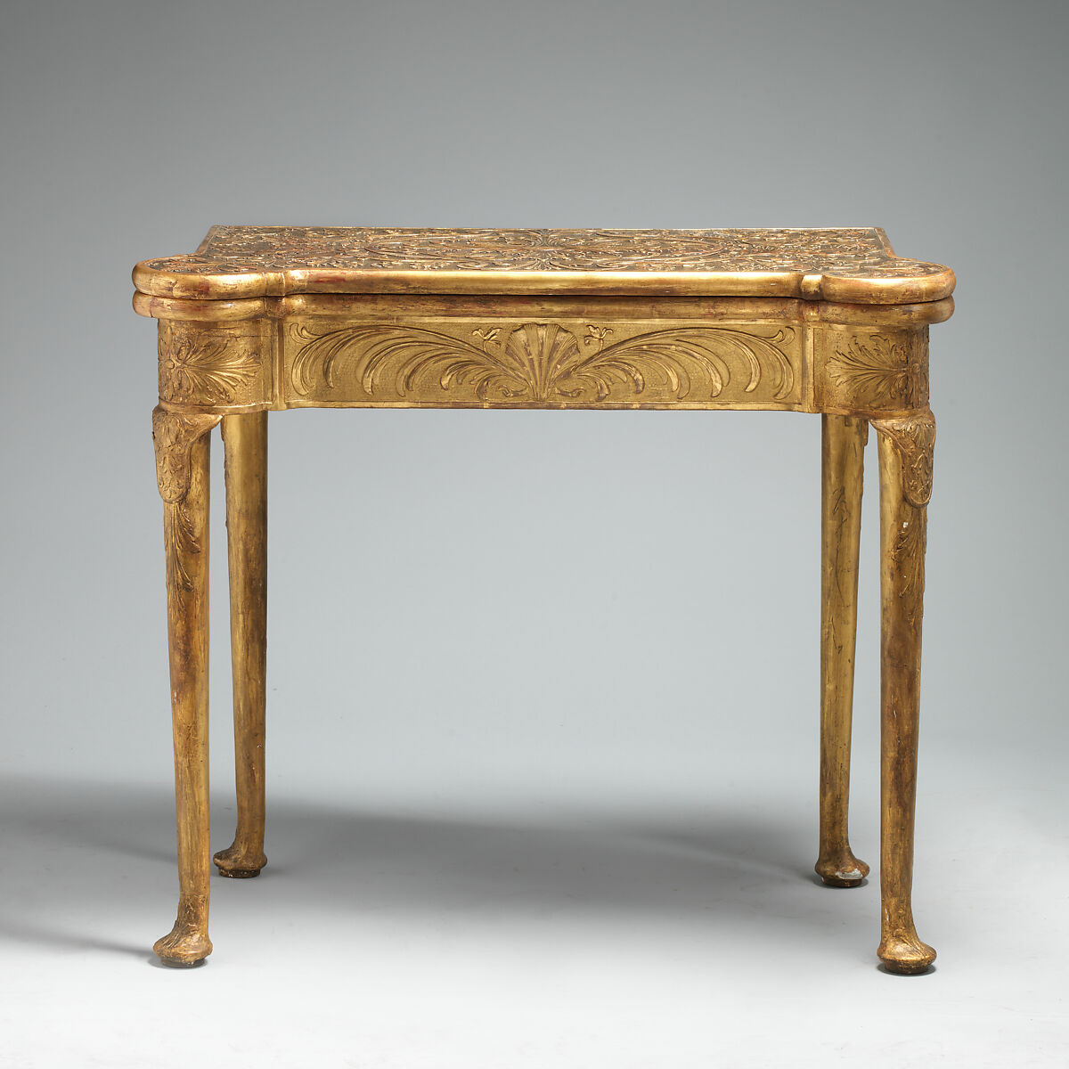 Card table, Oak; carved and gilded gesso; lined with modern felt; iron fittings, British