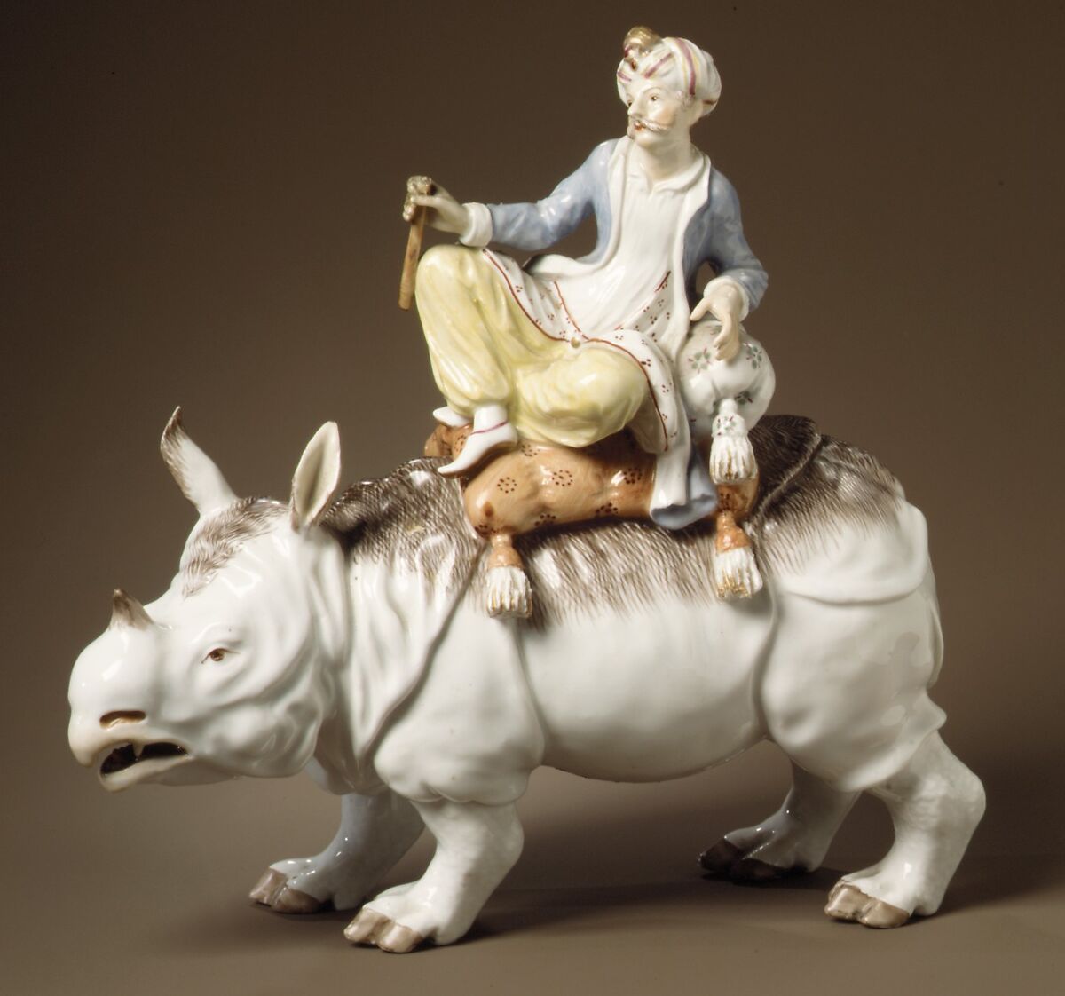 Turk on a rhinoceros, Ludwigsburg Porcelain Manufactory (German, 1758–1824), Hard-paste porcelain, gilt bronze, German, Ludwigsburg 