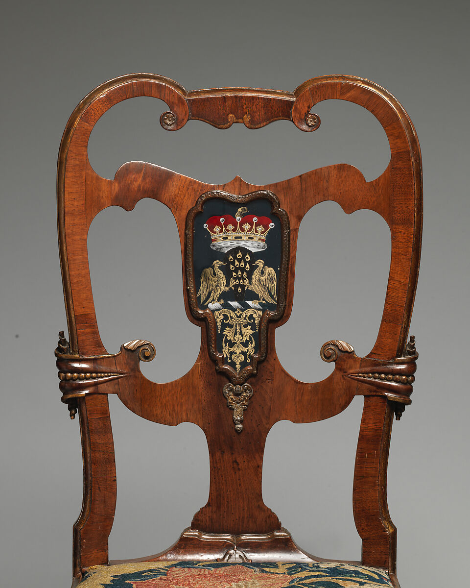 Pair of side chairs, Attributed to Thomas How (British, active 1710–33), Walnut and walnut veneer, parcel-gilt, the seat rails of beech; gilded lead mounts on the knees and front rail; verre églomisé panel mounted on the splat; covered in contemporary tent stitch embroidery on canvas needlework not original to the chair, British