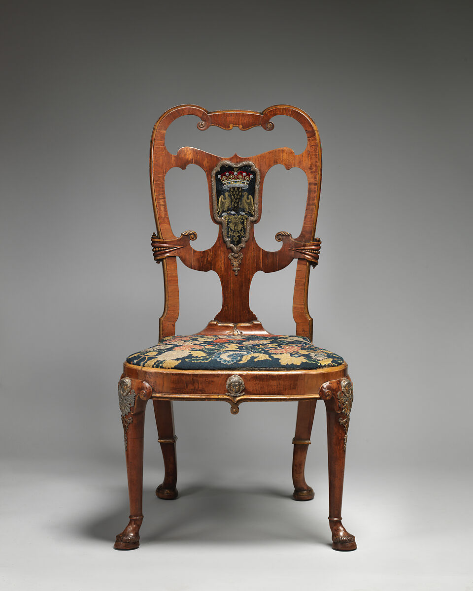 Pair of side chairs, Attributed to Thomas How (British, active 1710–33), Walnut and walnut veneer, parcel-gilt, the seat rails of beech; gilded lead mounts on the knees and front rail; verre églomisé panel mounted on the splat; covered in contemporary tent stitch embroidery on canvas needlework not original to the chair, British