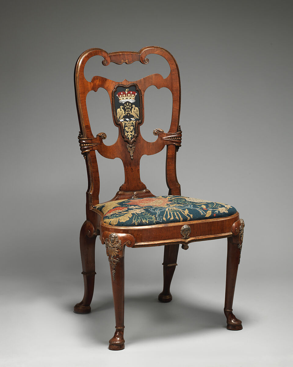 Pair of side chairs, Attributed to Thomas How (British, active 1710–33), Walnut and walnut veneer, parcel-gilt, the seat rails of beech; gilded lead mounts on the knees and front rail; verre églomisé panel mounted on the splat; covered in contemporary tent stitch embroidery on canvas needlework not original to the chair, British