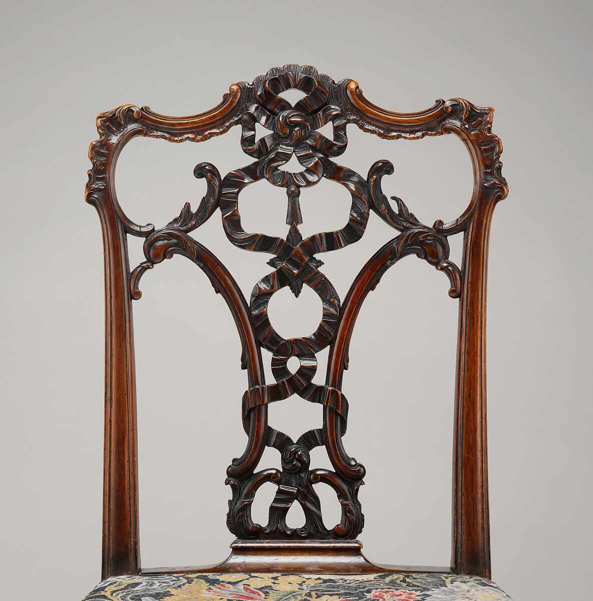 Side chair (one of a pair), After a design by Thomas Chippendale (British, baptised Otley, West Yorkshire 1718–1779 London), Mahogany; tent stitch embroidery on canvas, British
