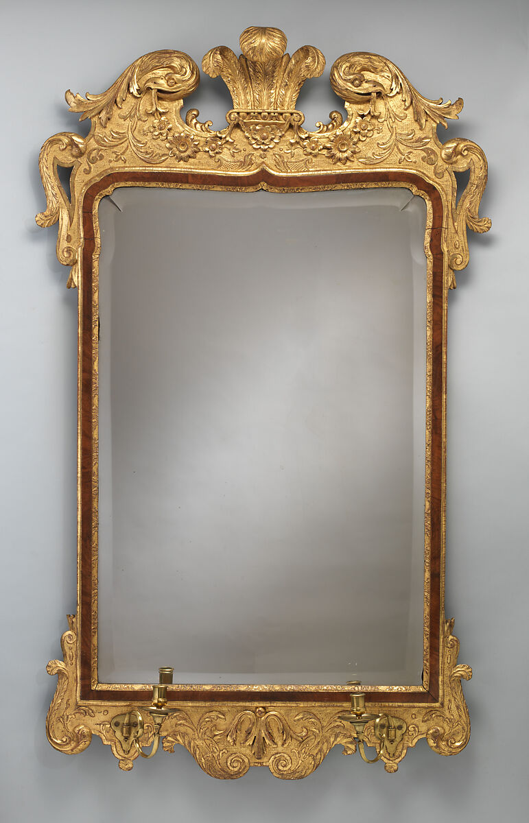 Mirror, Gilt gesso, walnut and walnut veneer, gilt brass, glass, British