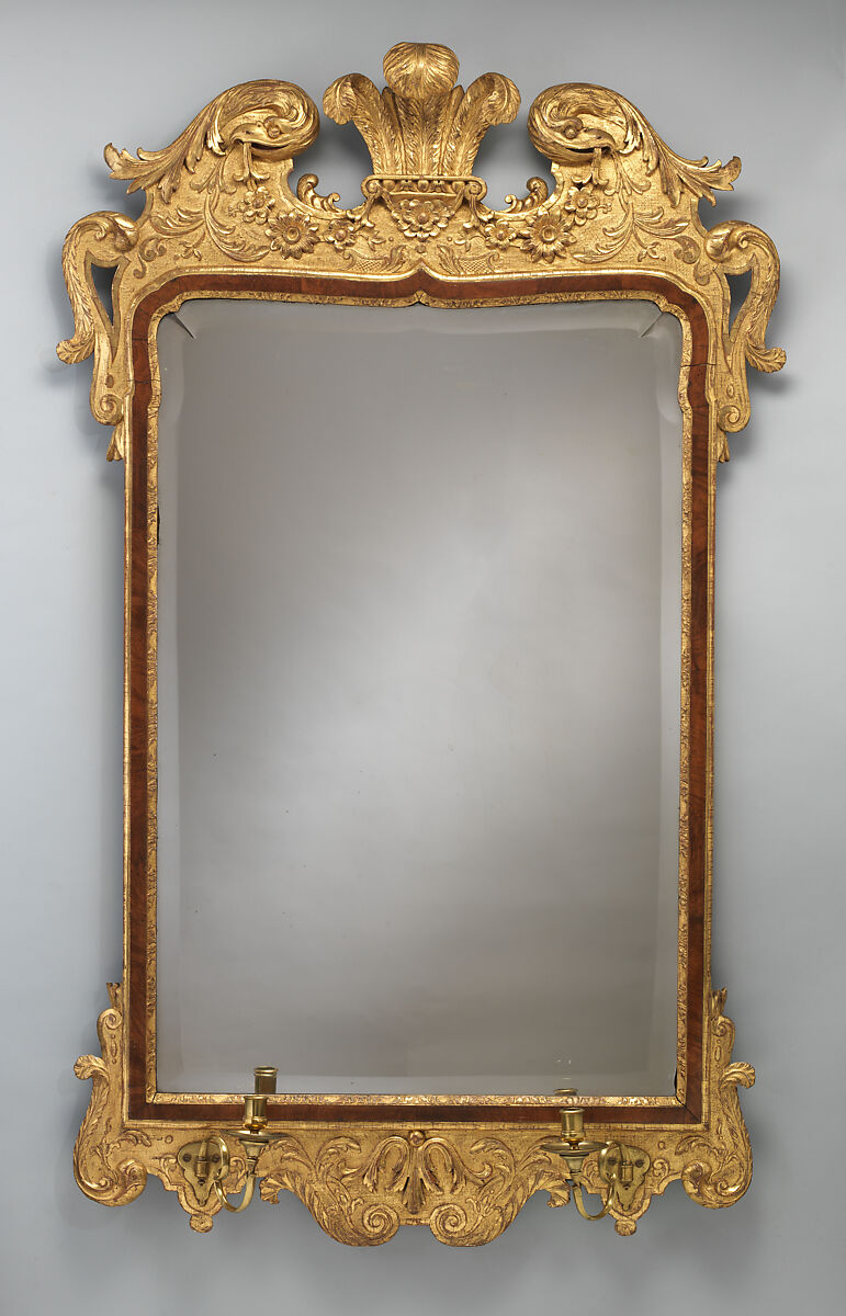 Mirror, Gilt gesso, walnut and walnut veneer, gilt brass, glass, British 