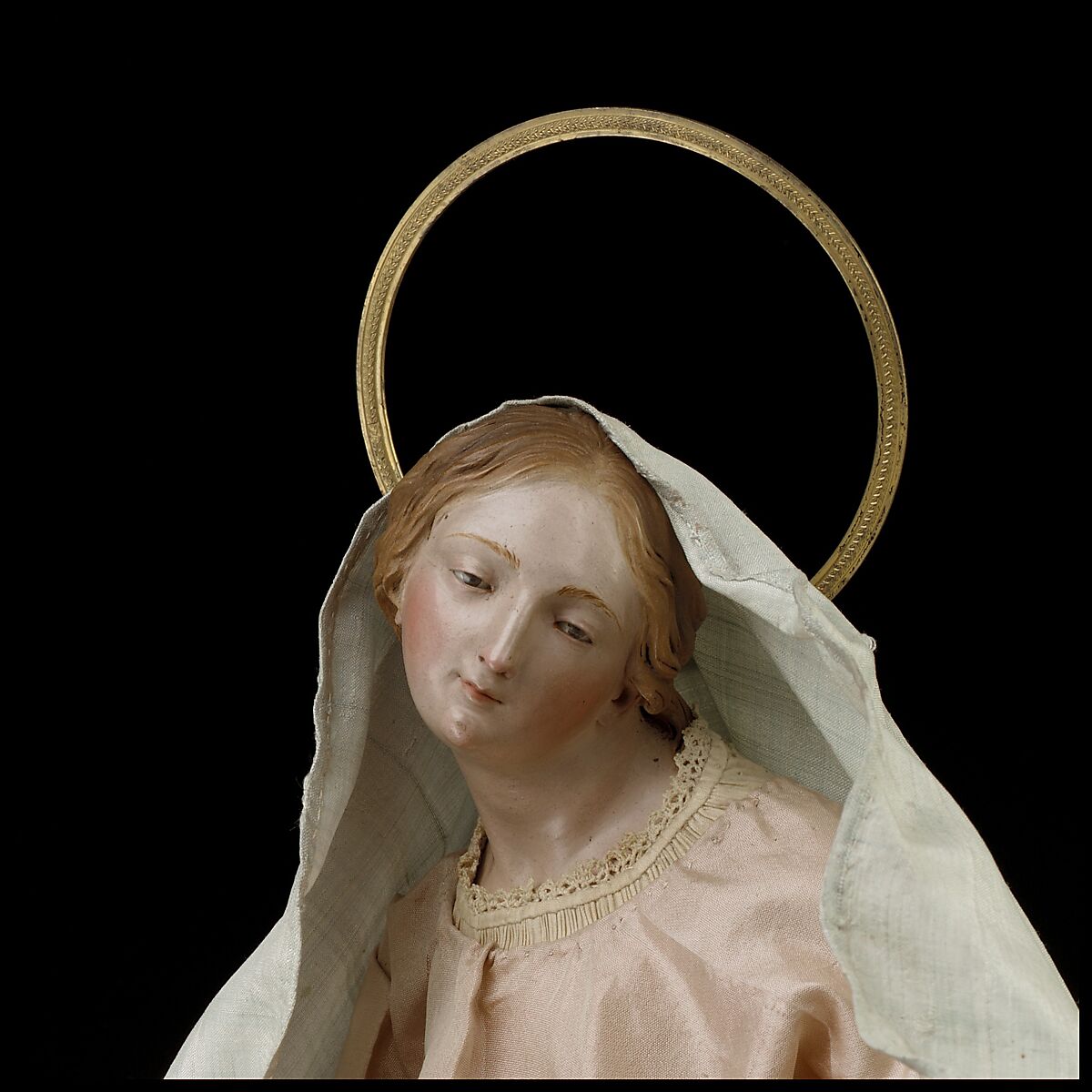 Virgin, Attributed to Salvatore di Franco (active 18th century), Polychromed terracotta head and wooden limbs; body of wire wrapped in tow; silver-gilt halo; silk and linen garments, Italian, Naples