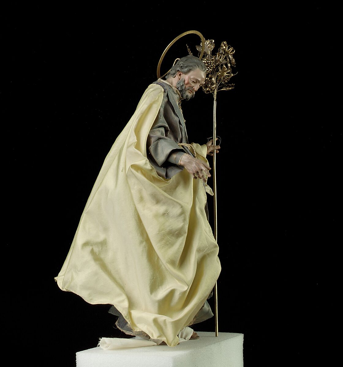 St. Joseph, Attributed to Salvatore di Franco (active 18th century), Polychromed terracotta head and wooden limbs; body of wire wrapped in tow; various fabrics; silver-gilt halo and staff, Italian, Naples