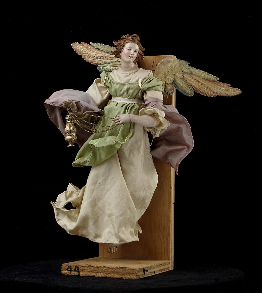 Angel, Attributed to Giuseppe Sanmartino (Italian, 1720–1793), Polychromed terracotta head; wooden limbs and wings; body of wire wrapped in tow; various fabrics, Italian, Naples 