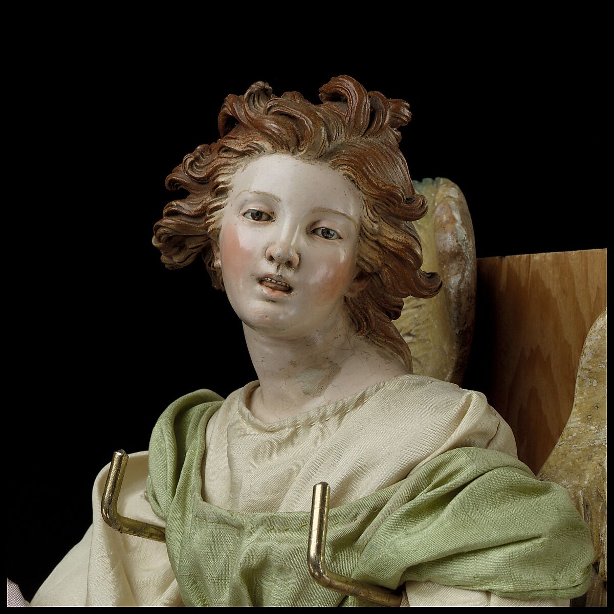 Angel, Attributed to Giuseppe Sanmartino (Italian, 1720–1793), Polychromed terracotta head; wooden limbs and wings; body of wire wrapped in tow; various fabrics, Italian, Naples