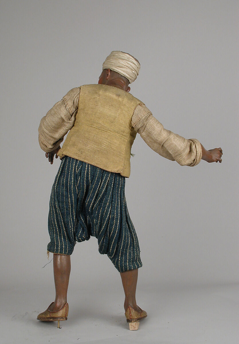 Oriental attendant, Polychromed terracotta head and wooden limbs; body of wire wrapped in tow; silk, linen and burlap garments, Italian, Naples