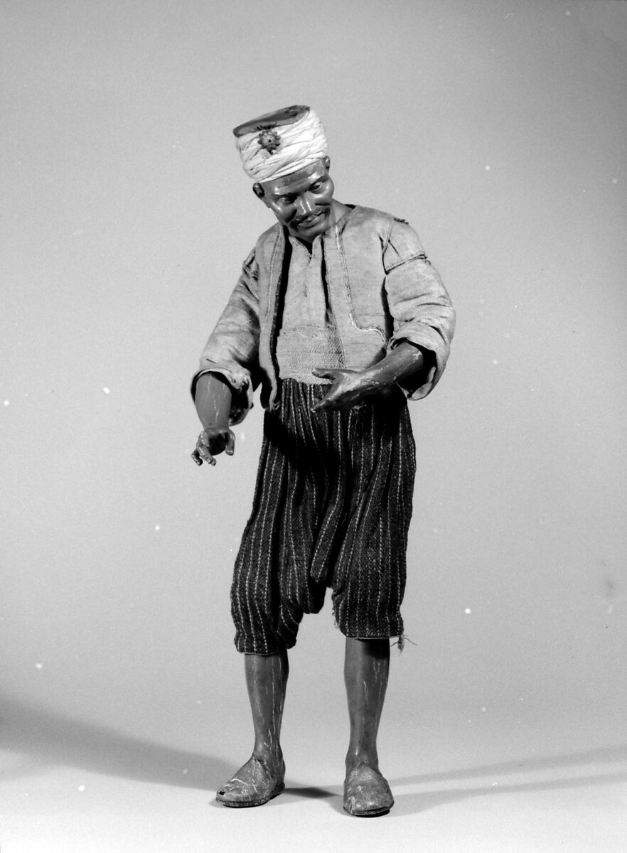 Oriental attendant, Polychromed terracotta head and wooden limbs; body of wire wrapped in tow; silk, linen and burlap garments, Italian, Naples