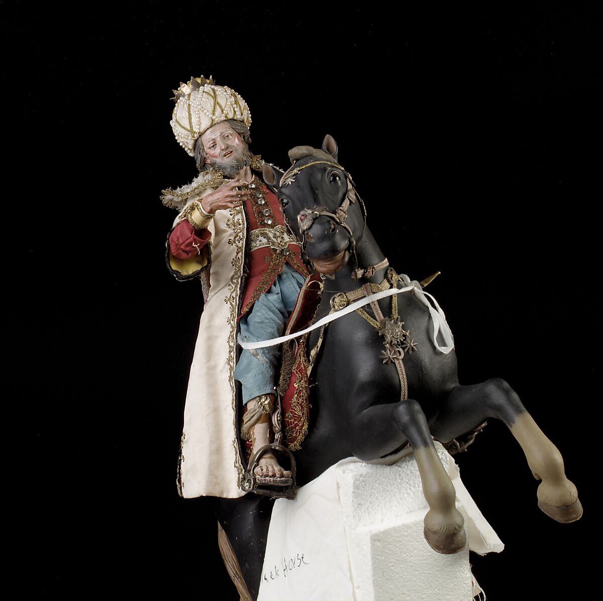 Elderly king, Polychromed terracotta head and wooden limbs; body of wire wrapped in tow; silk and satin garments; silver and gold metallic thread; glass buttons; silver-gilt sword, hilt and crown; leather sheath, Italian, Naples