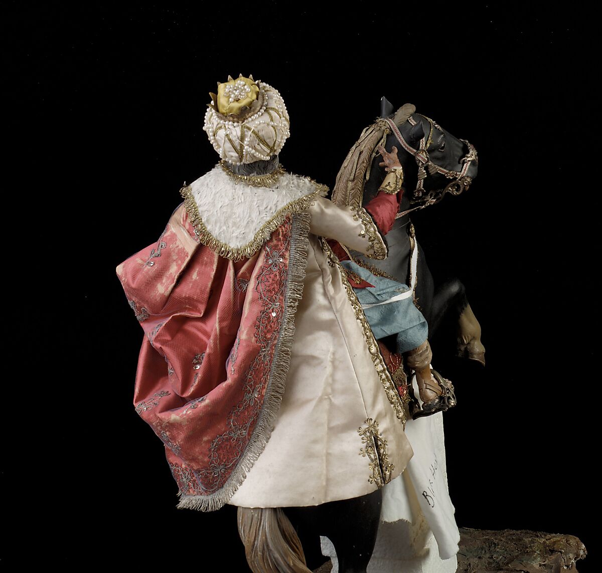 Elderly king, Polychromed terracotta head and wooden limbs; body of wire wrapped in tow; silk and satin garments; silver and gold metallic thread; glass buttons; silver-gilt sword, hilt and crown; leather sheath, Italian, Naples