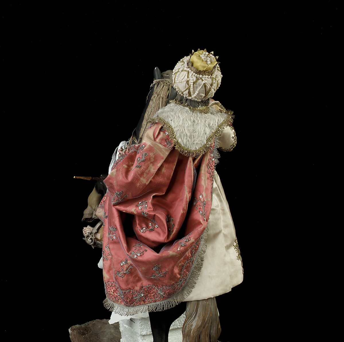 Elderly king, Polychromed terracotta head and wooden limbs; body of wire wrapped in tow; silk and satin garments; silver and gold metallic thread; glass buttons; silver-gilt sword, hilt and crown; leather sheath, Italian, Naples