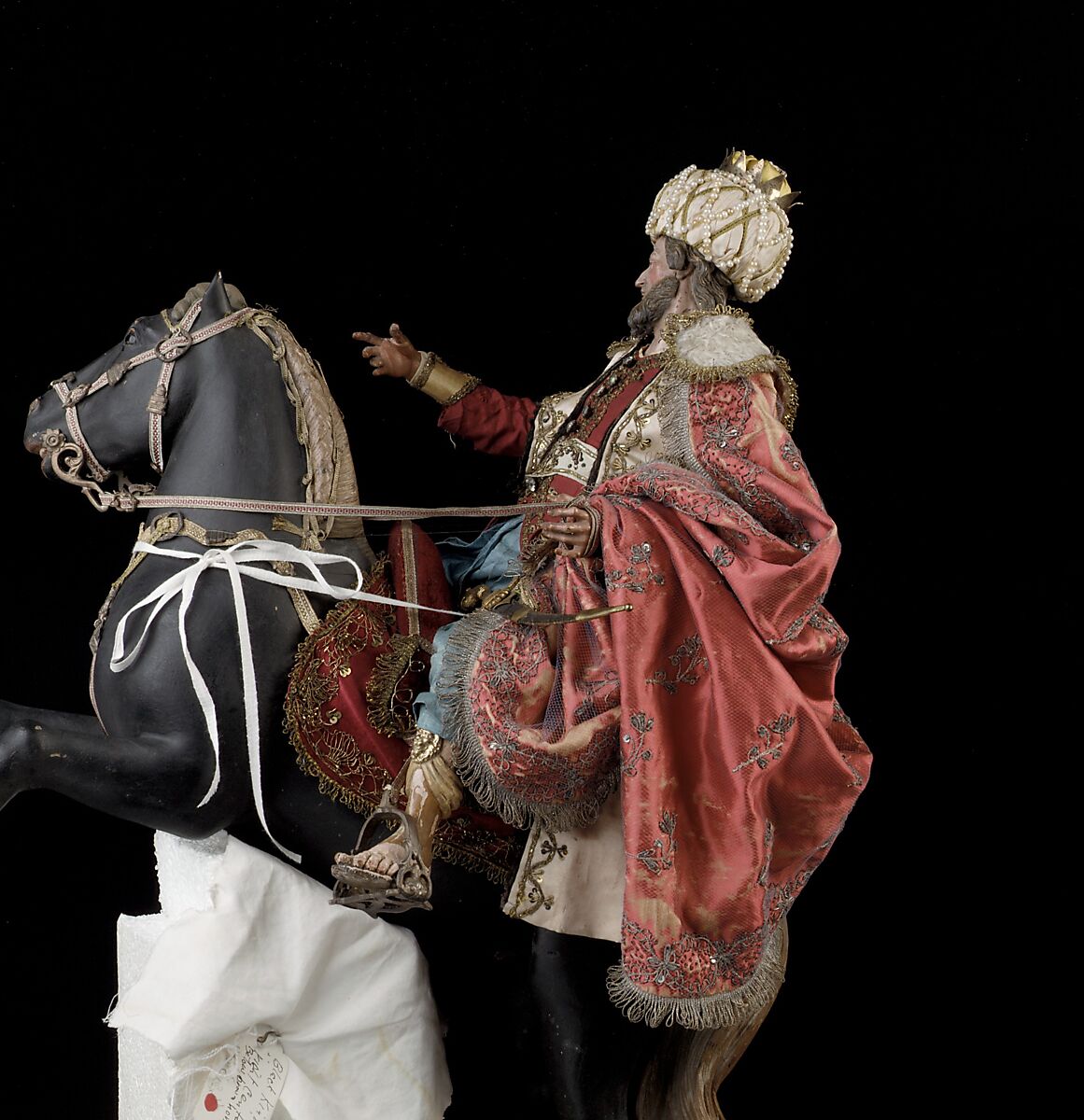 Elderly king, Polychromed terracotta head and wooden limbs; body of wire wrapped in tow; silk and satin garments; silver and gold metallic thread; glass buttons; silver-gilt sword, hilt and crown; leather sheath, Italian, Naples