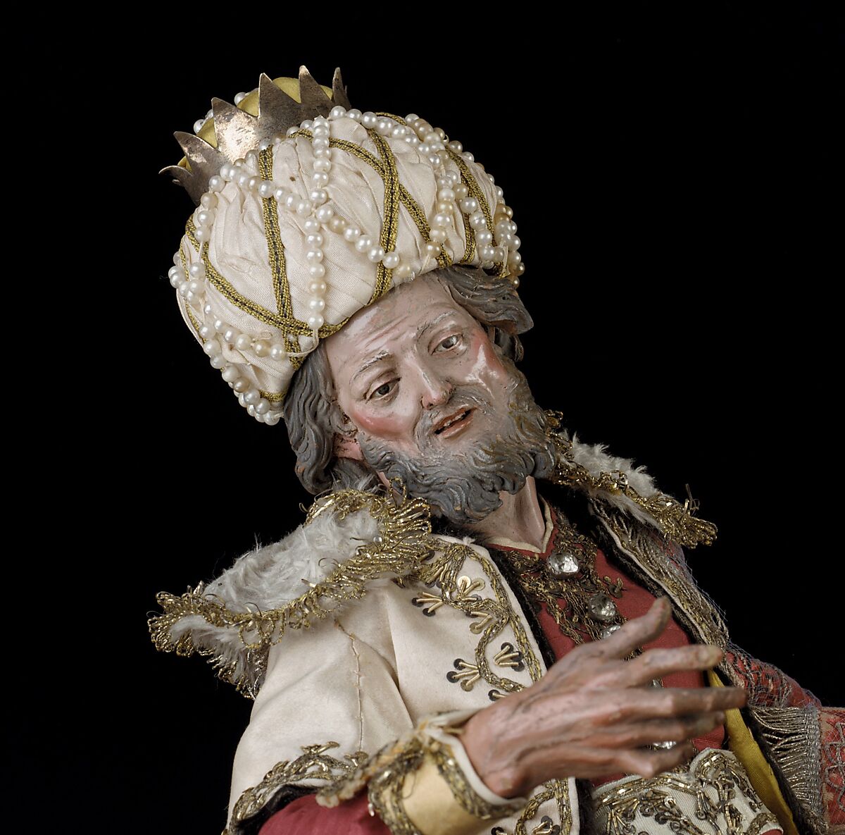 Elderly king, Polychromed terracotta head and wooden limbs; body of wire wrapped in tow; silk and satin garments; silver and gold metallic thread; glass buttons; silver-gilt sword, hilt and crown; leather sheath, Italian, Naples