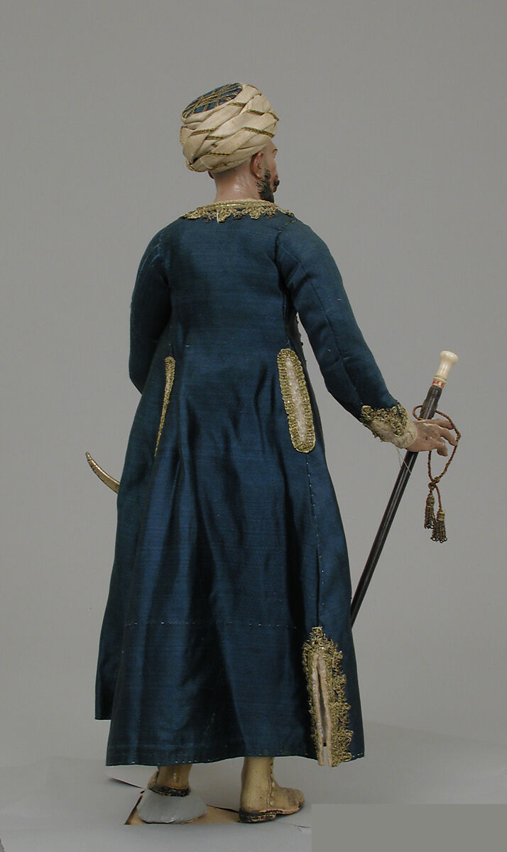 King's attendant, Giuseppe Gori (active ca. 1770–1810), Polychromed terracotta head and wooden limbs; body of wire wrapped in tow; cotton and satin garments with silver and gold metallic thread; velvet belt backed with leather; brass sword; wooden and ivory staff; glass stones on turban, Italian, Naples