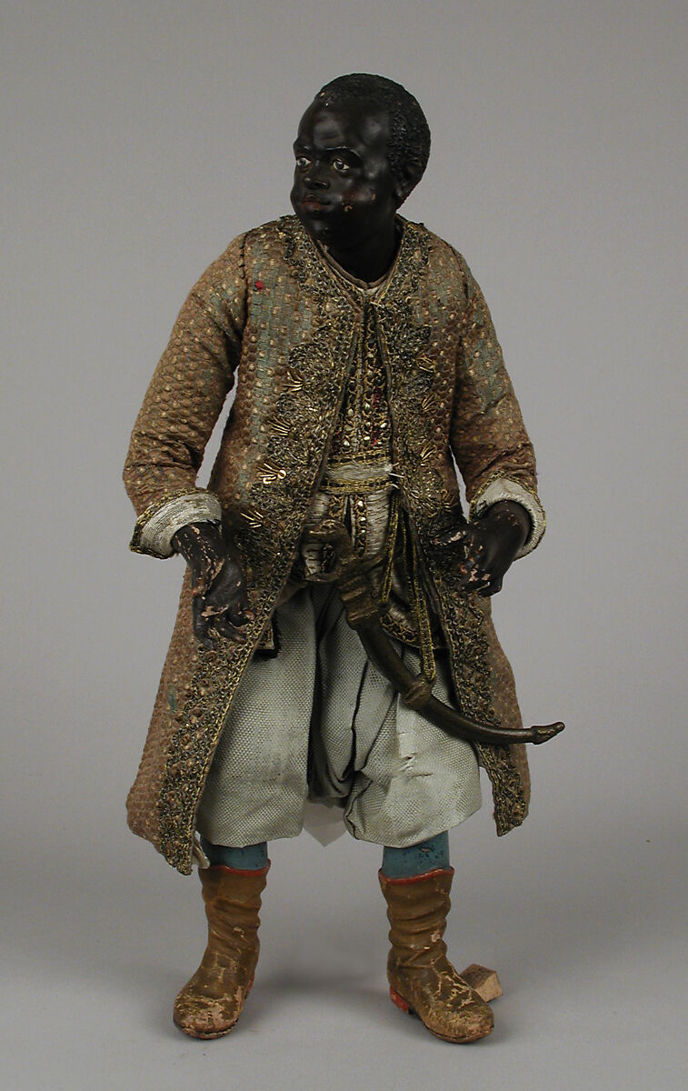 King's Moorish attendant, Polychromed terracotta head and wooden limbs; body of wire wrapped in tow; cotton and silk garments with silver and gold metallic thread; brass sword, Italian, Naples