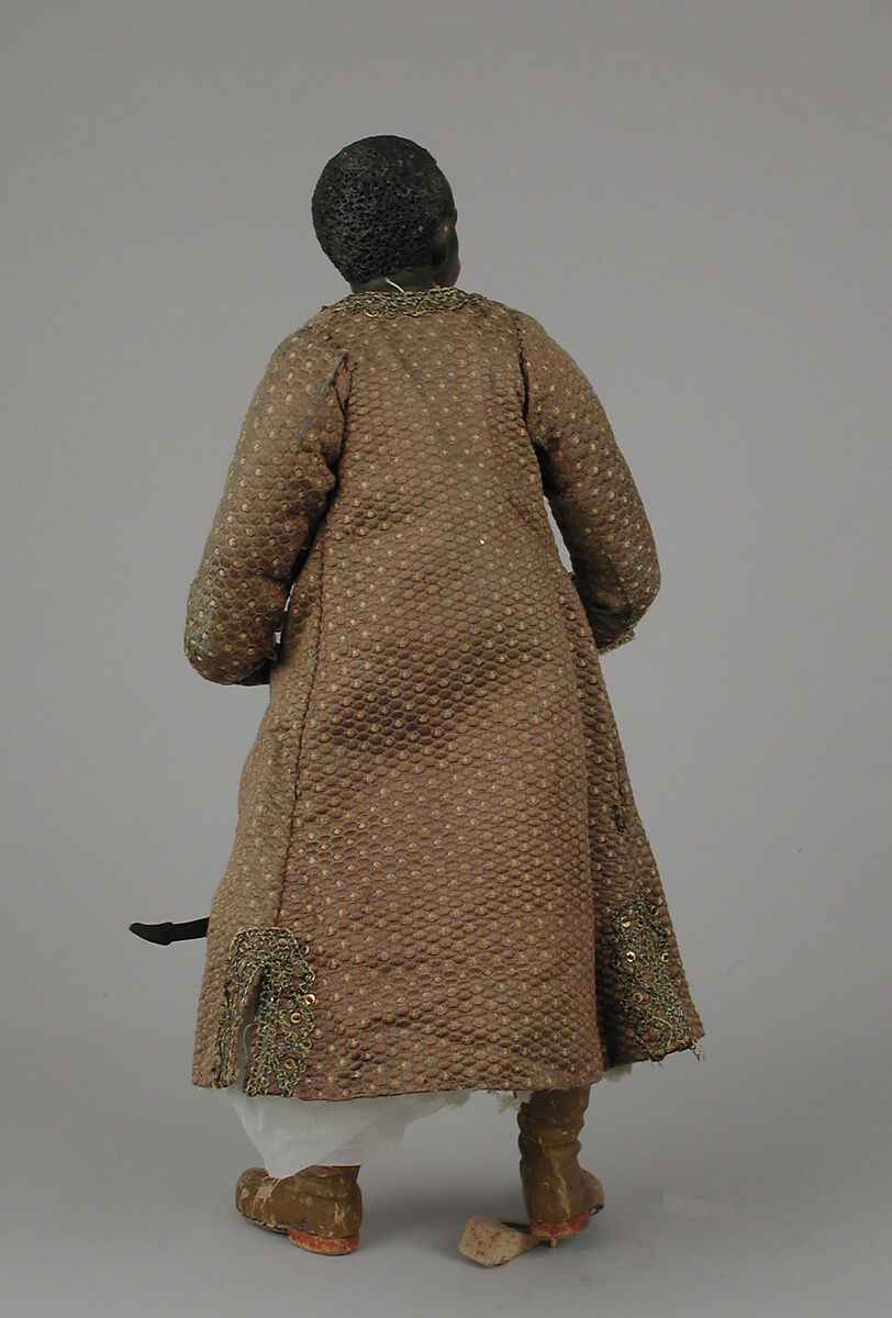 King's Moorish attendant, Polychromed terracotta head and wooden limbs; body of wire wrapped in tow; cotton and silk garments with silver and gold metallic thread; brass sword, Italian, Naples