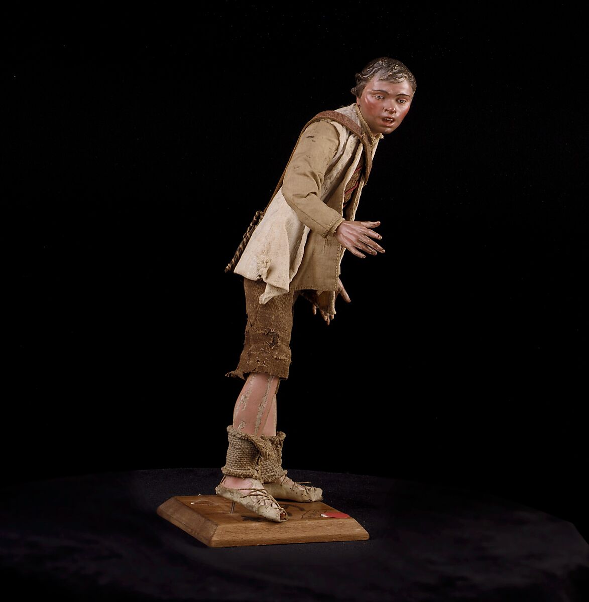 Shepherd, Polychromed terracotta head and wooden limbs; body of wire wrapped in tow; cotton and burlap garments; leather belt, shoes and shoulder bag, Italian, Naples