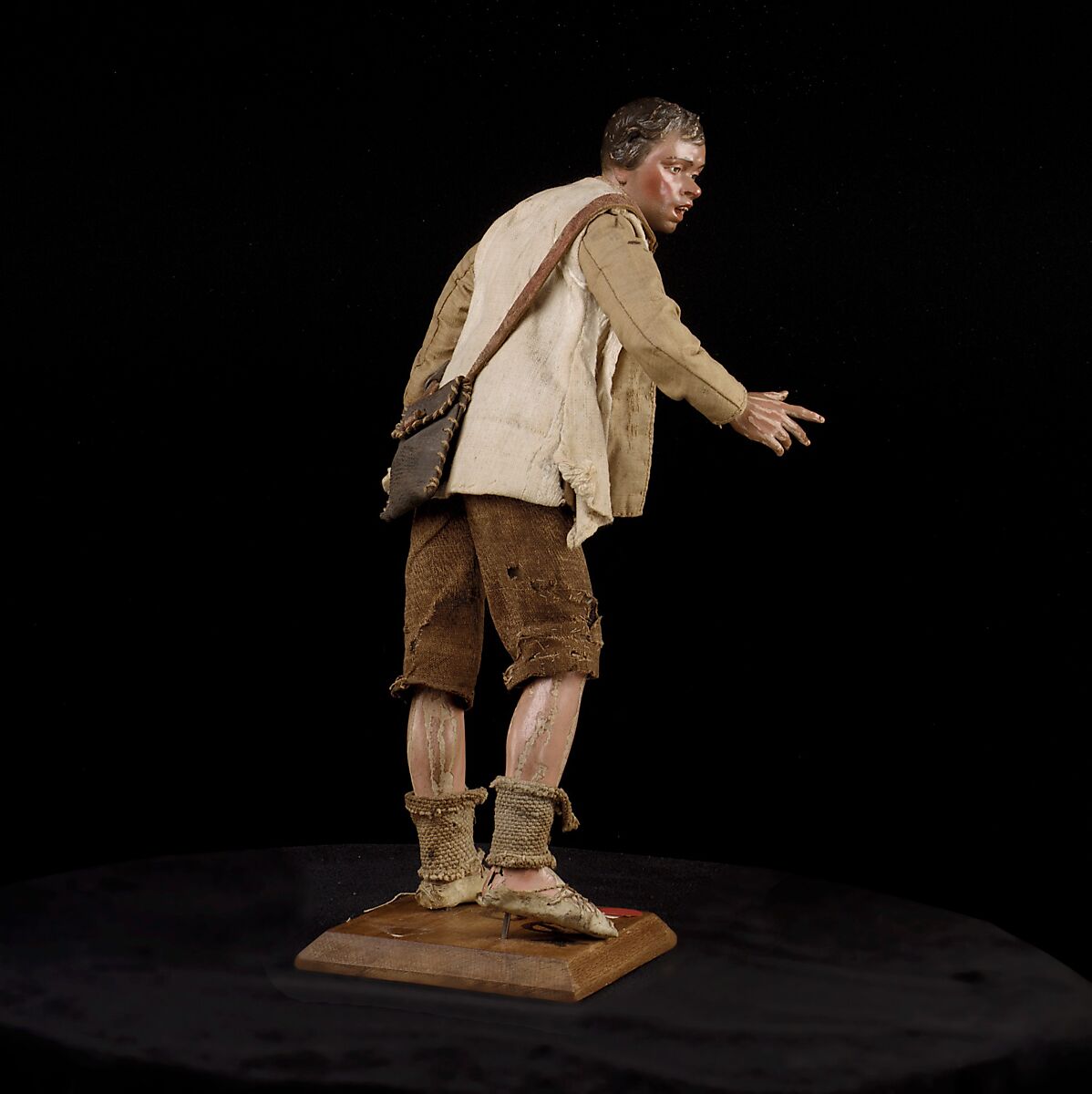 Shepherd, Polychromed terracotta head and wooden limbs; body of wire wrapped in tow; cotton and burlap garments; leather belt, shoes and shoulder bag, Italian, Naples