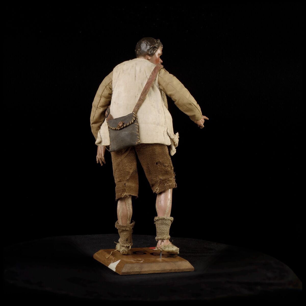 Shepherd, Polychromed terracotta head and wooden limbs; body of wire wrapped in tow; cotton and burlap garments; leather belt, shoes and shoulder bag, Italian, Naples