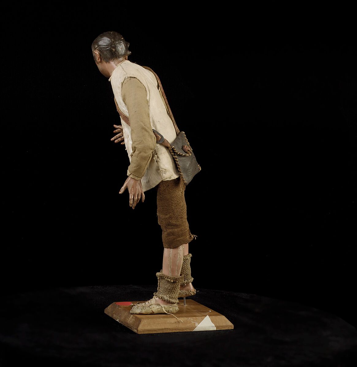 Shepherd, Polychromed terracotta head and wooden limbs; body of wire wrapped in tow; cotton and burlap garments; leather belt, shoes and shoulder bag, Italian, Naples