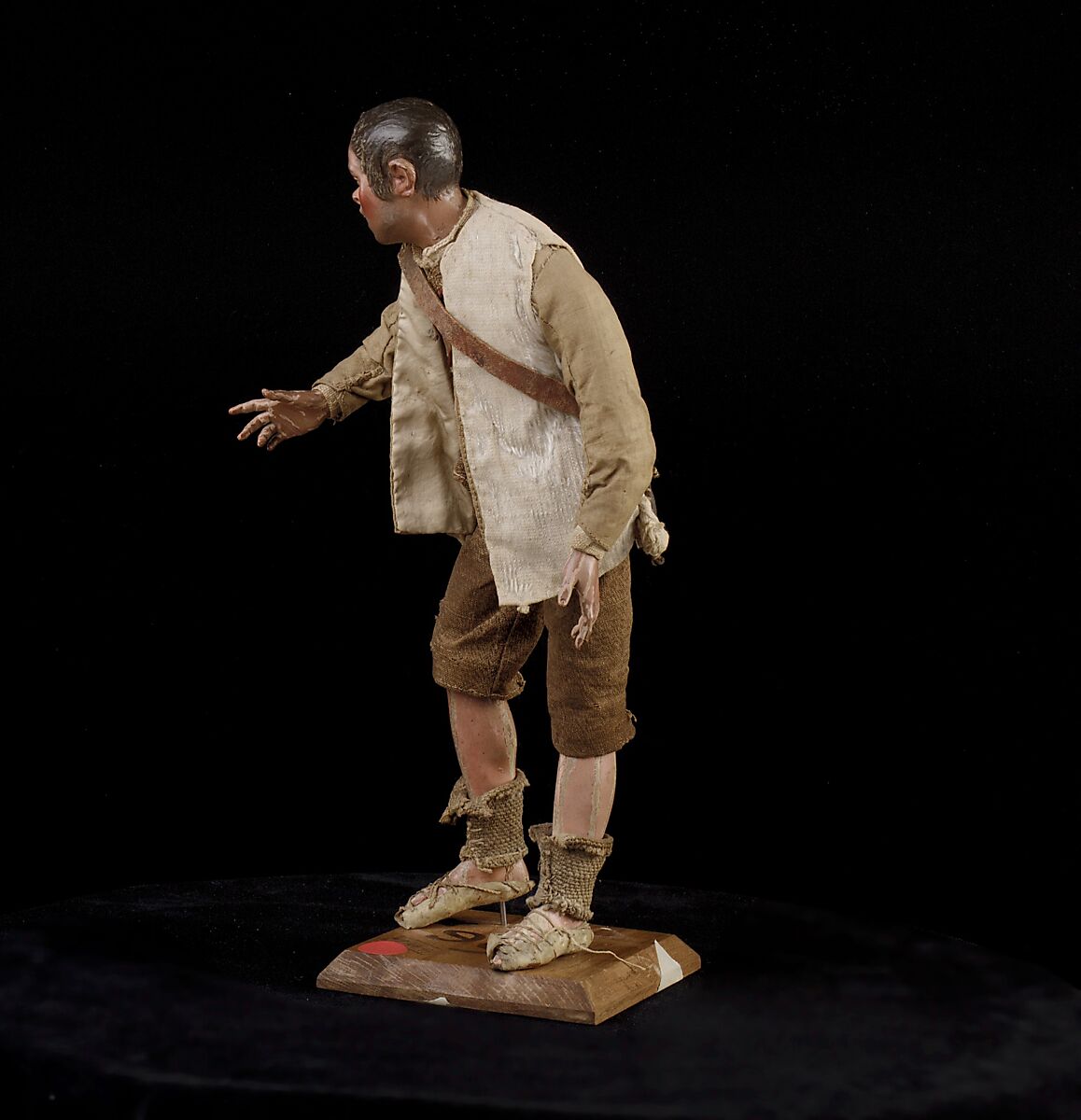 Shepherd, Polychromed terracotta head and wooden limbs; body of wire wrapped in tow; cotton and burlap garments; leather belt, shoes and shoulder bag, Italian, Naples