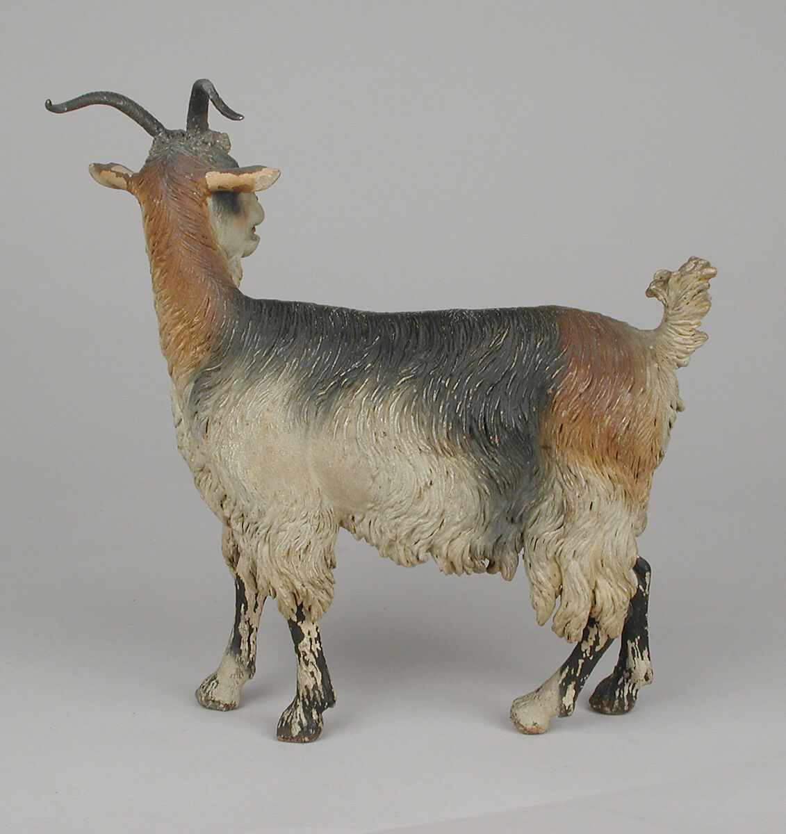 Female adult goat, Polychromed terracotta body, wooden legs, metal horns, Italian, Naples