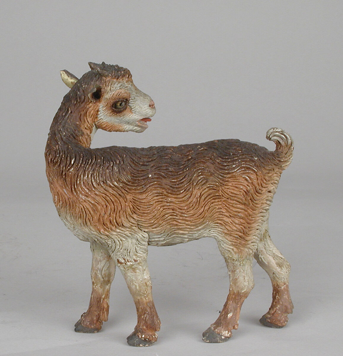 Kid, Polychromed terracotta body, wooden legs, metal ears, Italian, Naples