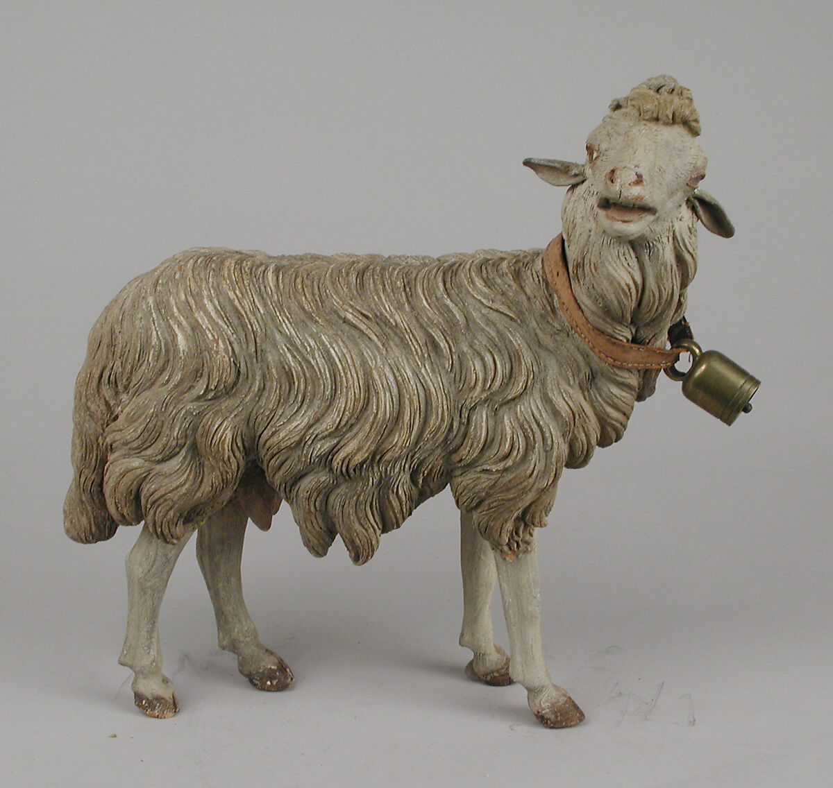 Standing sheep, Polychromed terracotta body, wooden legs, metal ears, Italian, Naples 