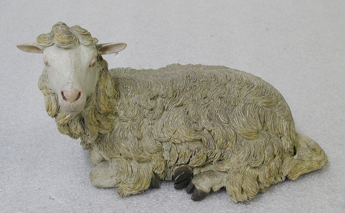 Seated sheep, Polychromed terracotta body and wooden ears, Italian, Naples