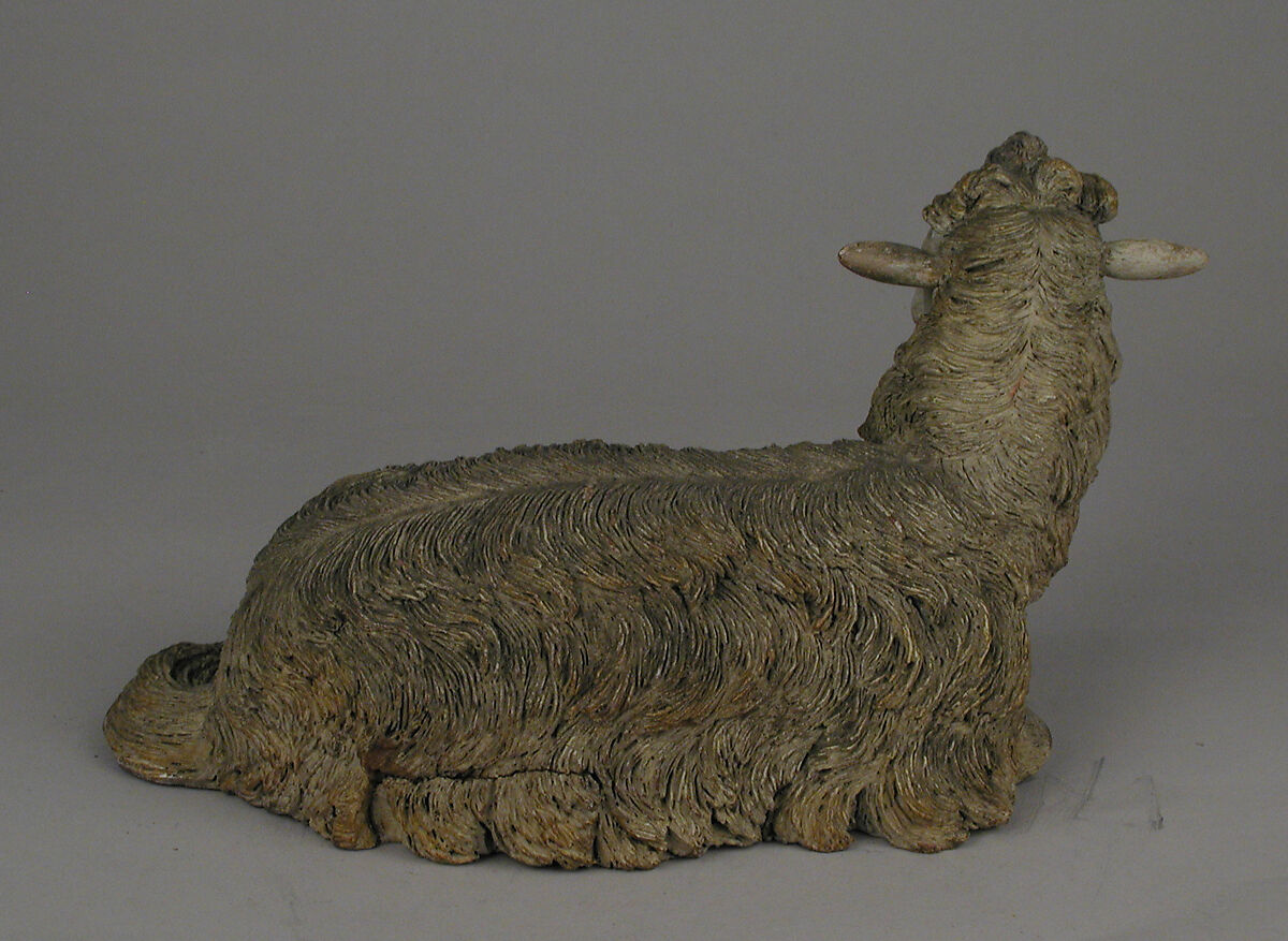 Seated sheep, Polychromed terracotta body and wooden ears, Italian, Naples