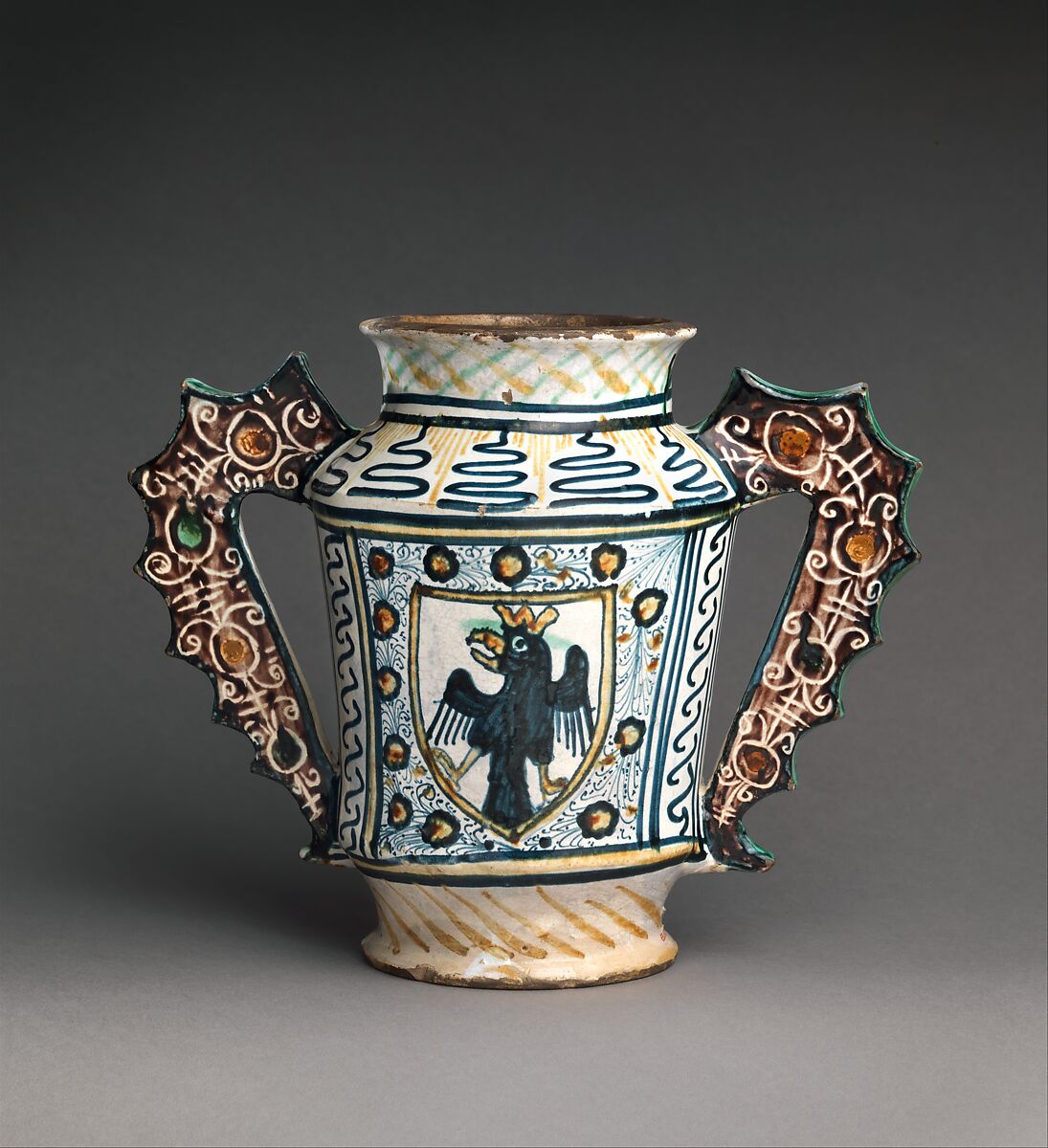 Two-handled storage jug (albarello) with crowned eagles, Maiolica (tin-glazed earthenware), Italian, Deruta 