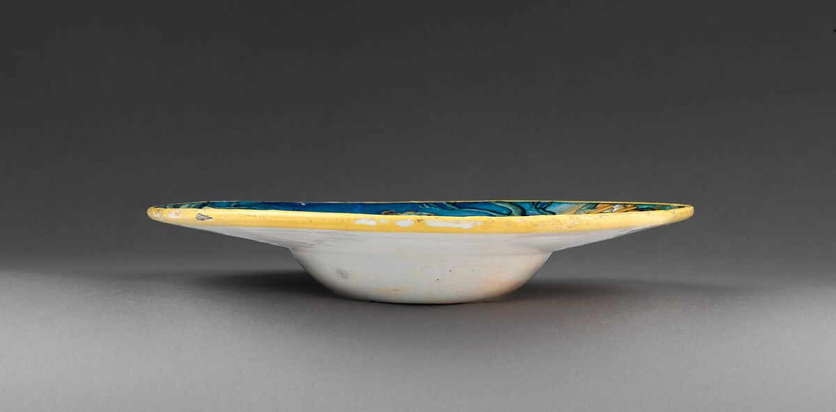 Wide-rimmed bowl with Perseus and Andromeda, Probably "In Castel Durante" Painter (Italian, active Castel Durante, first half of 16th century), Maiolica (tin-glazed earthenware), Italian, Urbino or Castel Durante