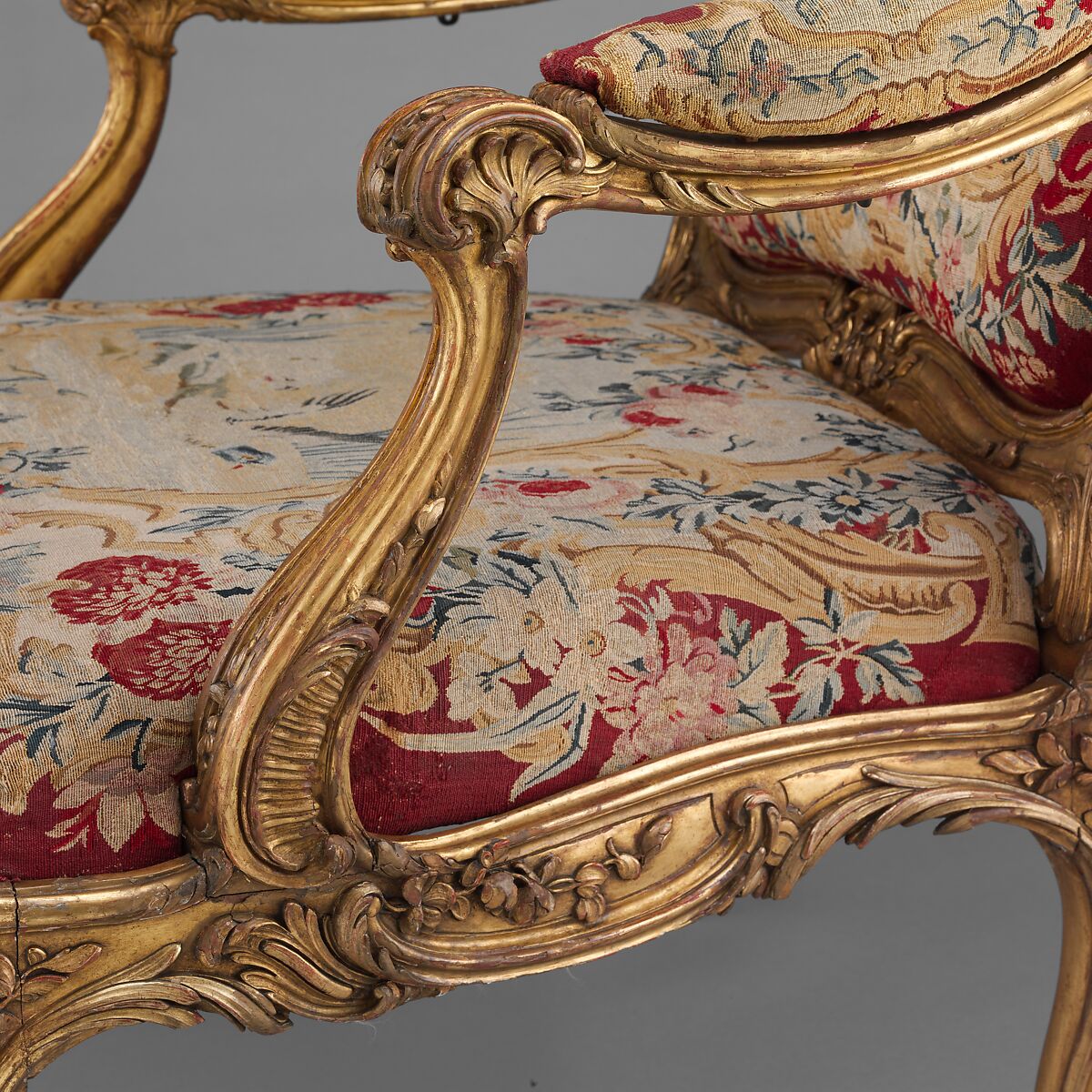 Armchair (fauteuil à la reine) (part of a set), Frame by Nicolas-Quinibert Foliot (1706–1776, warden 1750/52), Carved and gilded beech; wool and silk tapestry, French, Paris