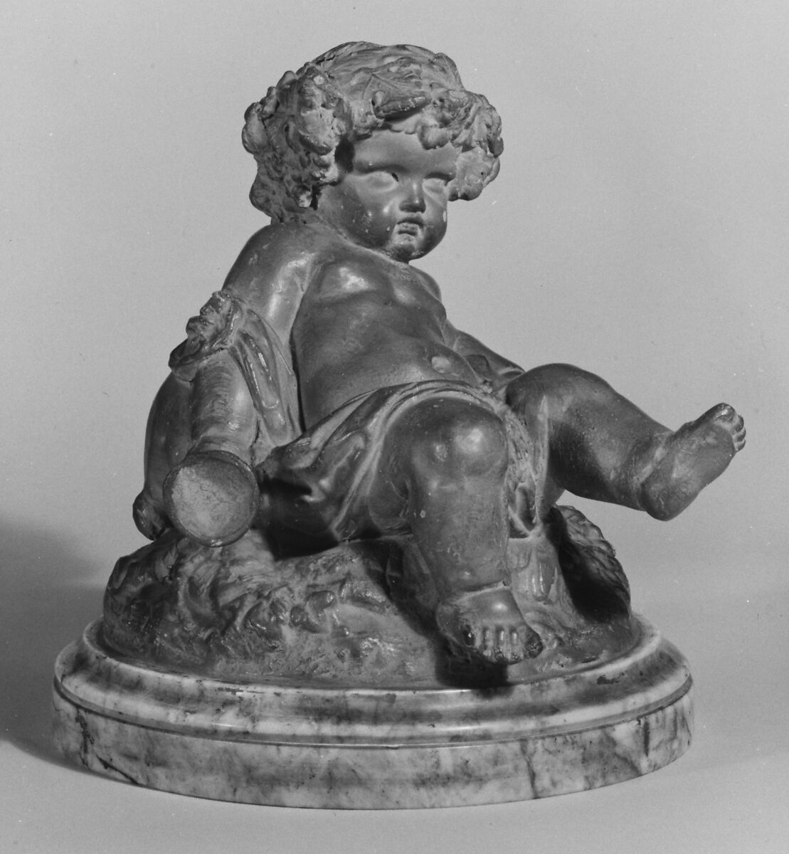 Bacchic infant, Terracotta; base: red and gray variegated white marble, French 
