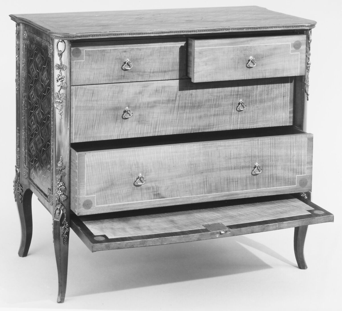 Commode (one of a pair) (part of a set), Marquetry of various woods, bronze and gilt-bronze mounts, British