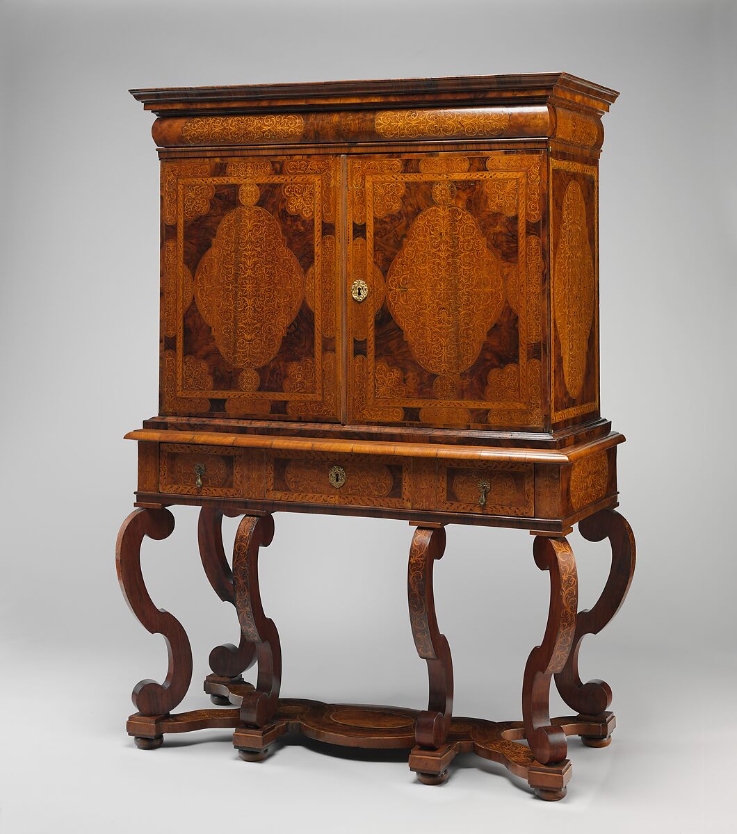 Cabinet on stand, Pine veneered with marquetry of walnut, burl walnut, holly; oak drawers; walnut legs; brass hardware, some of it replaced, British 