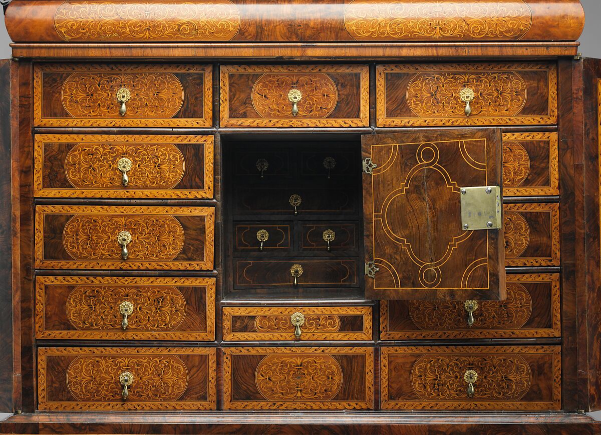 Cabinet on stand, Pine veneered with marquetry of walnut, burl walnut, holly; oak drawers; walnut legs; brass hardware, some of it replaced, British